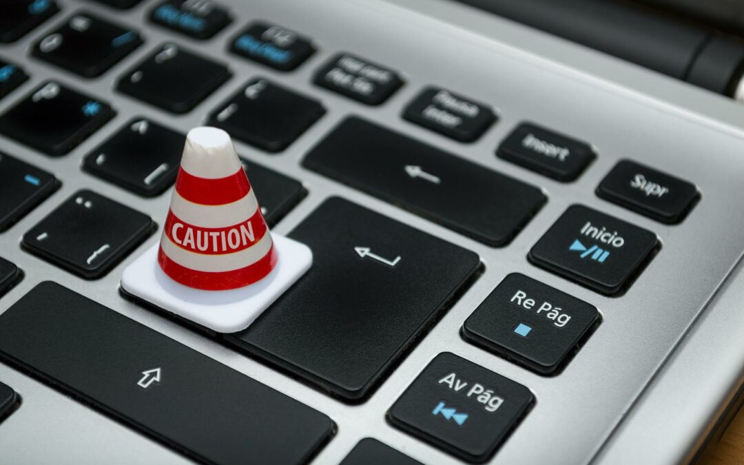white caution cone on keyboard